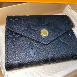LV Monogram Empreinte Leather Wallet
